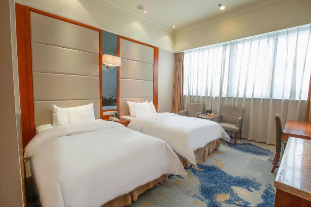 Linyi Blue Horizon Intenational Hotel Exterior photo